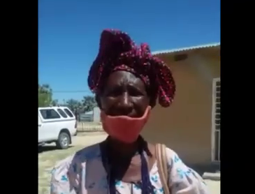 Old woman excited about casting her vote