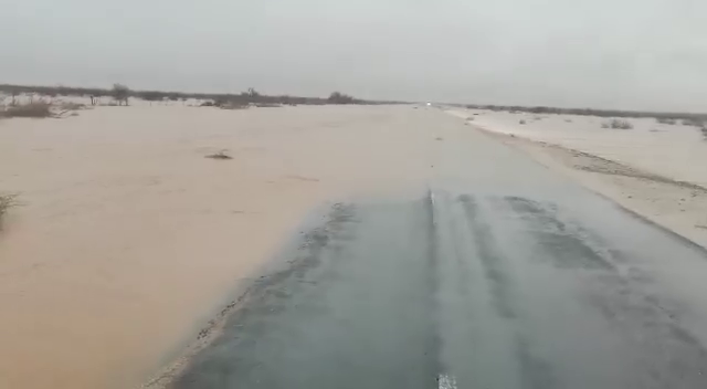 Dangerous driving conditions on flooded road