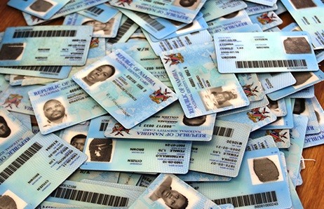 Officials arrested for identity theft