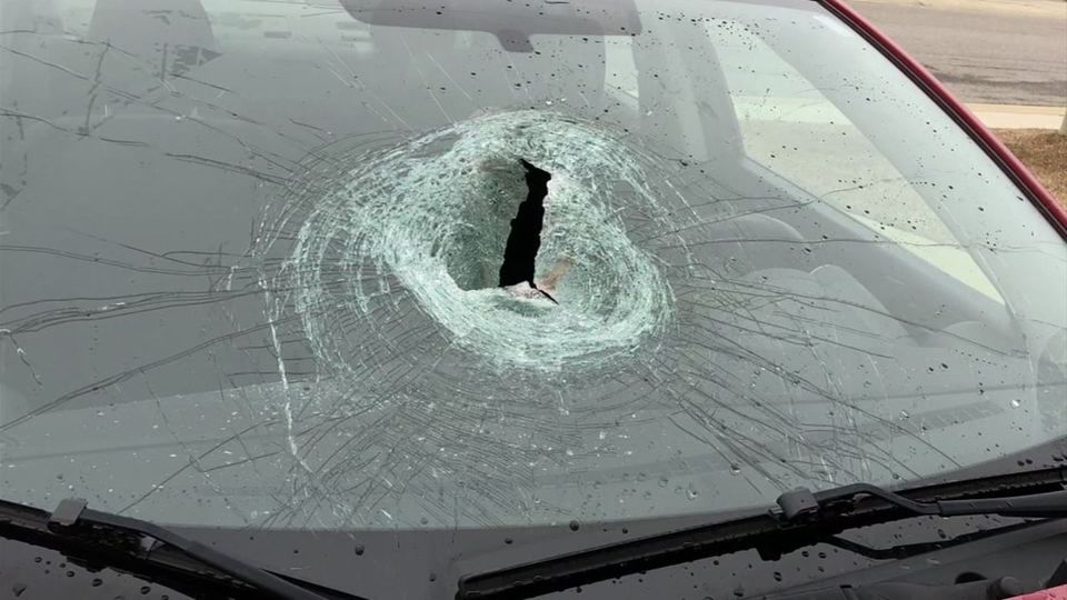Woman killed by flying brick