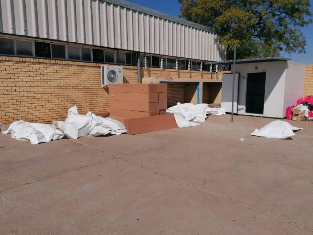 distraught mortuary missing body family struggling body father cremation