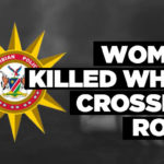 Woman killed while crossing road