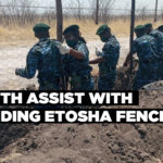Youth assist with mending Etosha fence