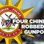 Four Chinese robbed at gunpoint