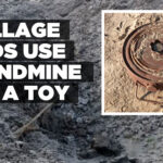 Village kids use landmine as a toy