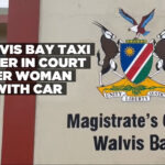 Man bumps woman with car after argument over taxi fare