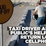 A taxi driver is looking for the owner of a cellphone dropped in his cab