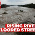 RISING RIVERS, FLOODED STREETS